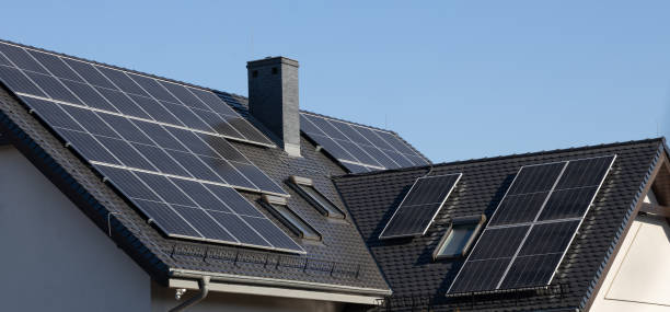 istock Modern House with Solar Panels on Roof 2157347236