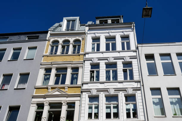 istock restored and decorated narrow old town houses 2157351449