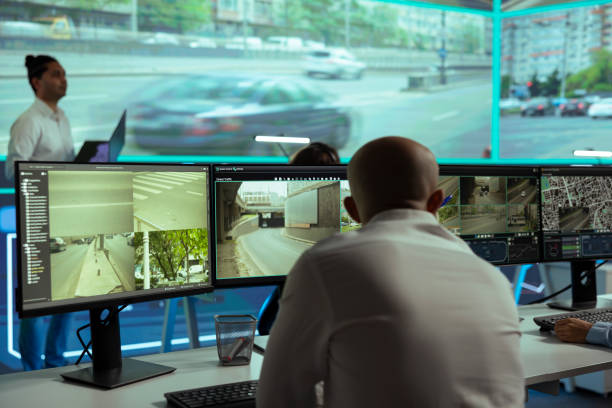istock Middle eastern man overseeing traffic surveillance footage on multiple displays 2157353307
