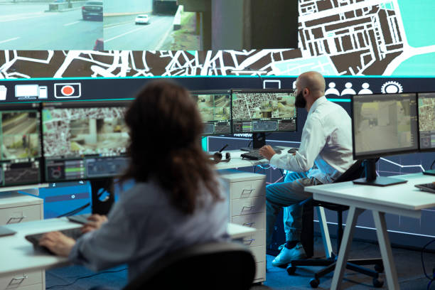 istock Diverse employees giving gps coordinates to couriers via satellite navigation 2157355501