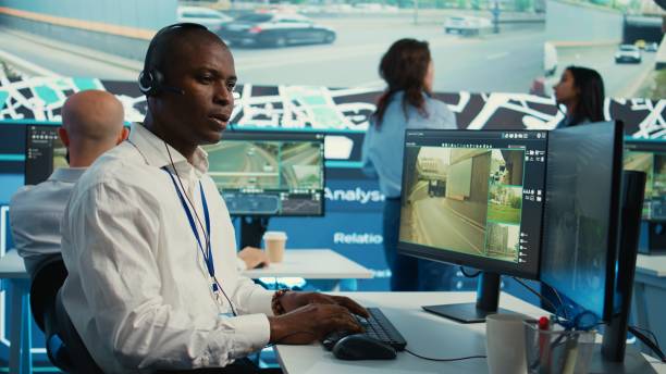 istock African american dispatch operator gives directions and gps coordinates 2157356808