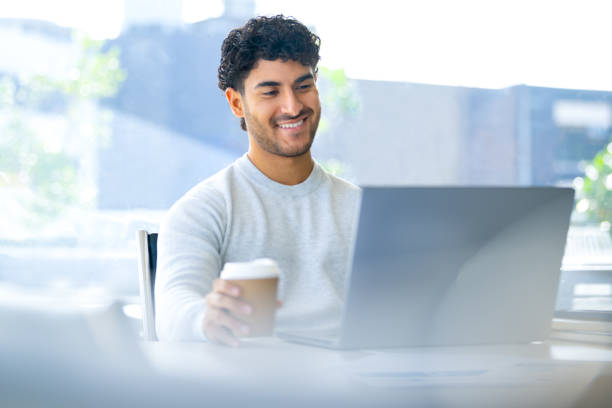 istock Businessman working on a laptop computer in the office. 2157358712