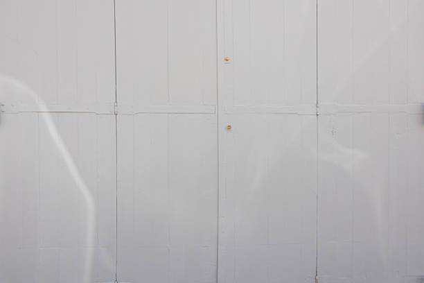 wooden door covered with white paint.