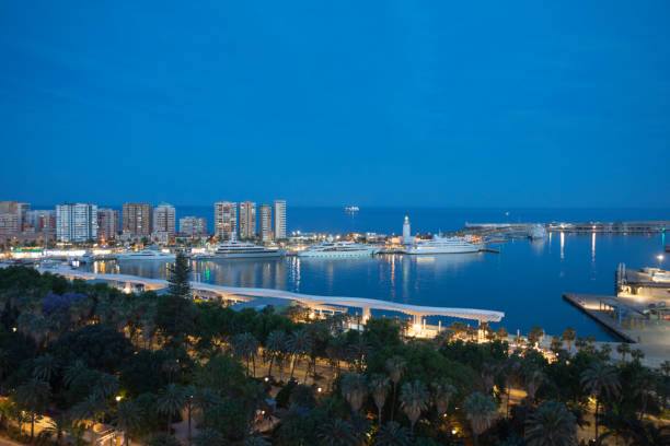 View of Malaga Port at dusk in May, Andalusia, Spain
