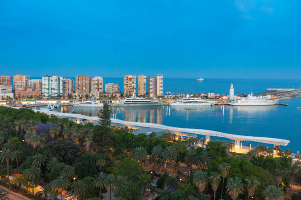 View of Malaga Port at dusk in May, Andalusia, Spain