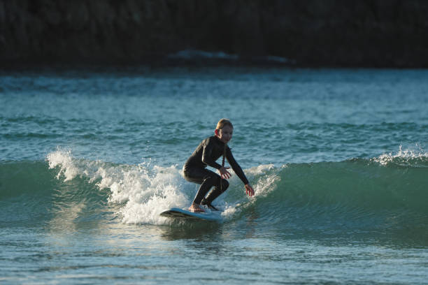 istock Kid Surfing, New Zealand Coast 2157365192