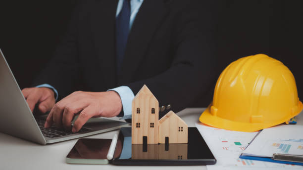 istock Real estate agents offer housing estates in projects, Presenting information about homes and purchasing. Real estate trading concept, Planning to buy property, Real estate business 2157367473