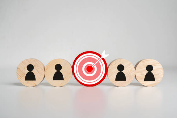 istock Customer relationship management concept. wooden block with target icon linked. 2157368239