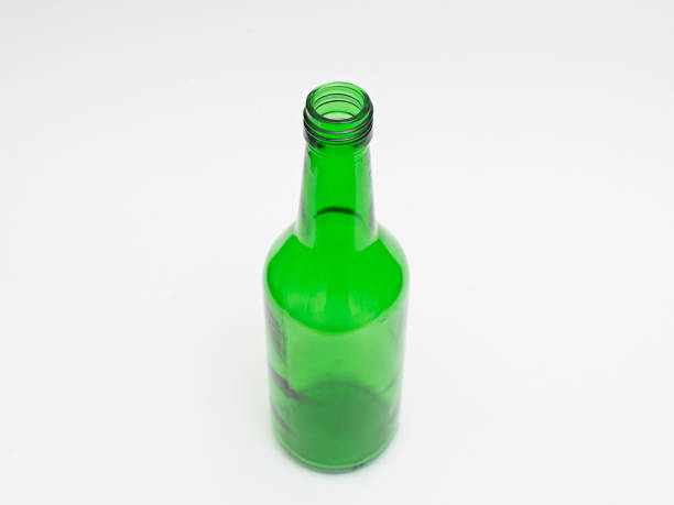 istock Green glass bottle on white background isolates 2157374404