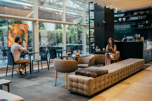 istock Business people having coffee at hotel 2157374447