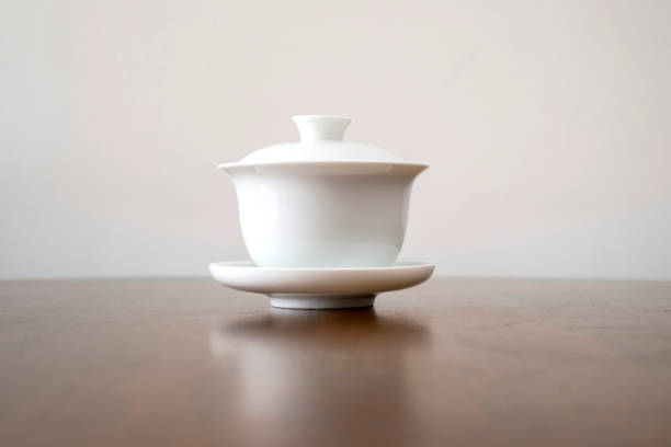 istock White teacups were isolated on the dining table 2157374652