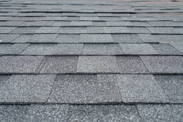 istock close up on new installed roof shingle 2157374930