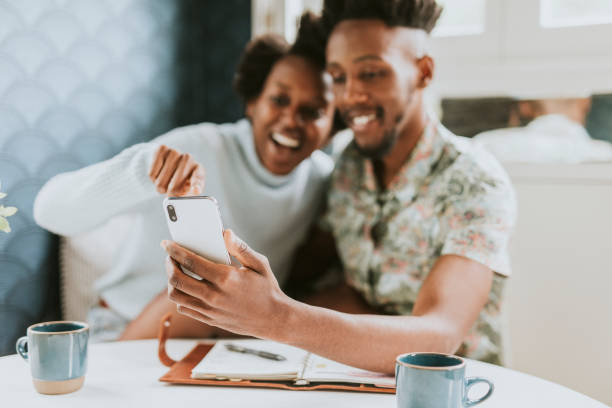 istock Cheerful black couple taking a picture 2157376682