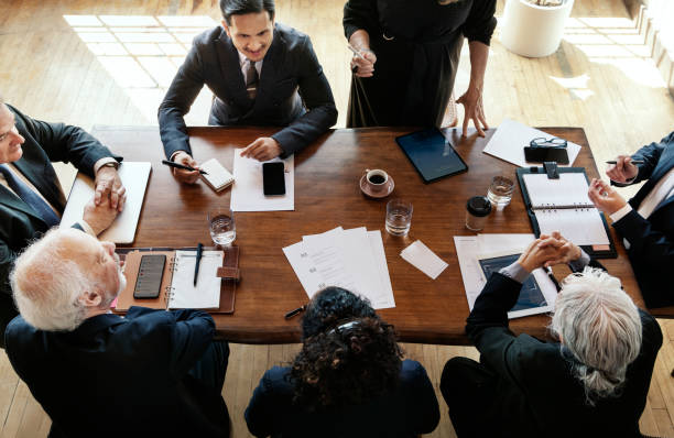 istock Businesspeople brainstorming in a meeting 2157378787