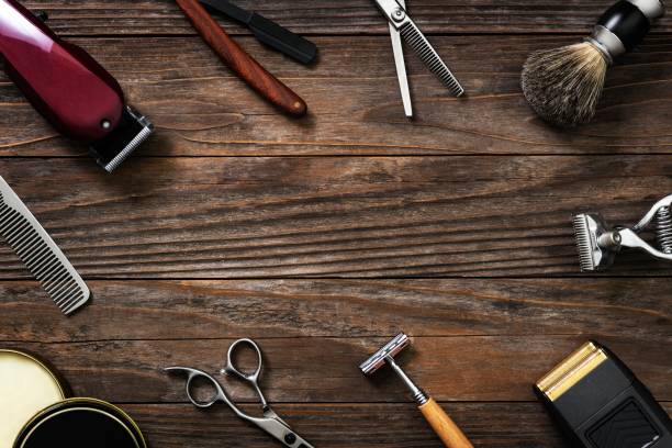 istock Vintage frame salon tools on a wooden table in jobs and career concept 2157381237