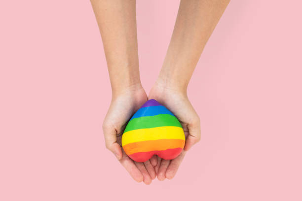 istock LGBTQ+ community heart with hands presenting 2157381572