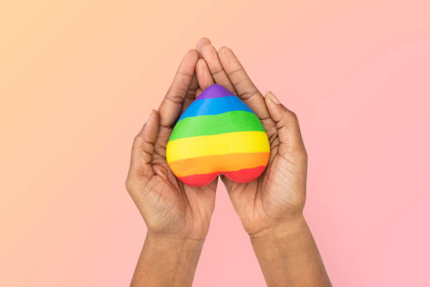 istock LGBTQ+ community heart with hands presenting 2157381627