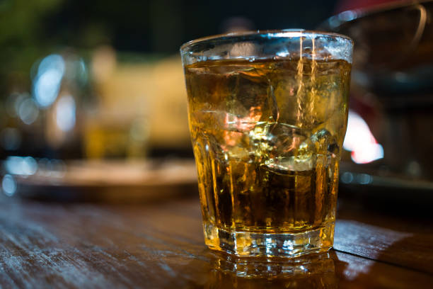 istock Closeup glass of whiskey with ice 2157381801