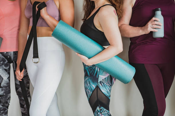istock Group of sportive people in yoga class 2157382398