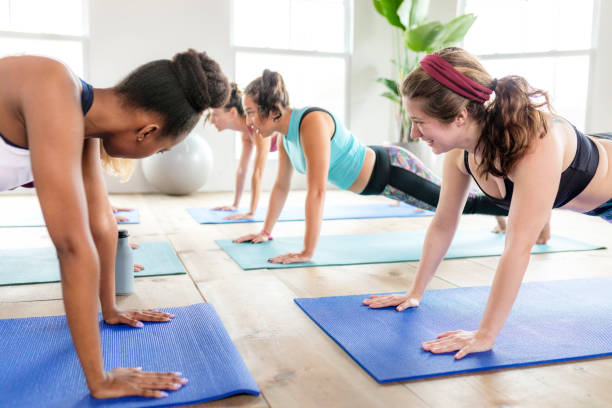 istock Group of diverse people in yoga class 2157383151