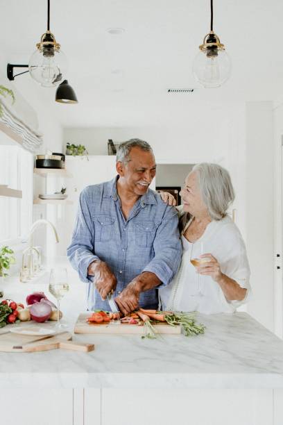 istock Elderly couple cooking in a kitchen 2157383819