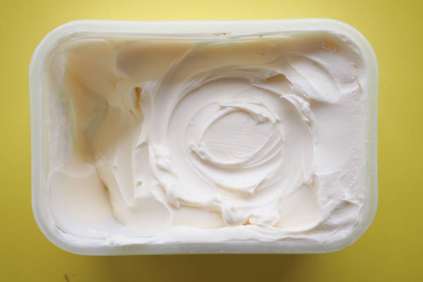 istock close up of fresh butter in a container 2157383957