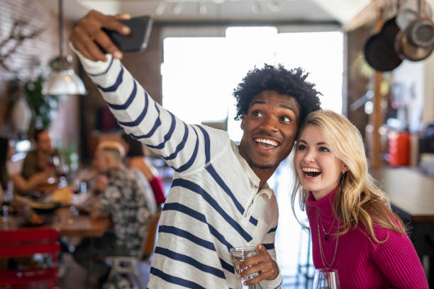 istock Friends taking a selfie at a party 2157384032