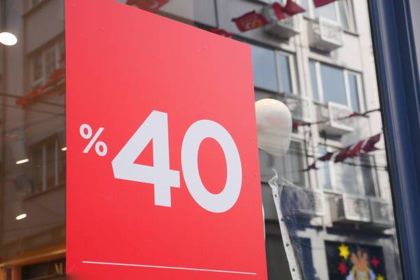 istock Large Sale text letters on red background on clothing store . 2157384049