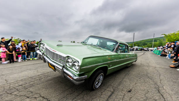 2nd June 2024, Shizukuishi, Iwate Japan. American Lowriders have a cult following in Japan.  Here they can show off their hydraulics at a car meet up with other Japanese enthusiasts in a car park.