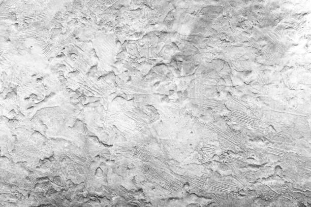 Black and white closeup old metal plate, abstract background with copy space, full frame horizontal composition