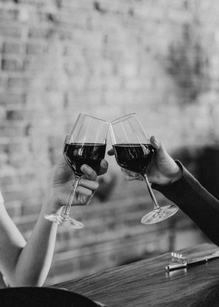 istock Friends making a toast at a dinner party 2157384559