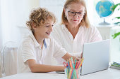 child-in-school-student-in-class-boy-at-homework.jpg?b=1&s=170x170&k=20&c=M6dRpC-aWoJBb4Nh9Pz8rE7StGyNoujdtvFB8594jEA=