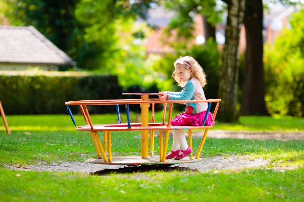 istock Kids explore nature. Children play in sunny park. 2157384970