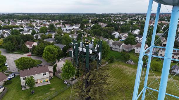 istock Cell Phone Tower Still Under Construction In A Neighborhood 2157386317
