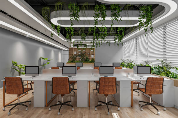 istock A modern open-plan office with abundant natural light, indoor plants, and workstation 2157387193