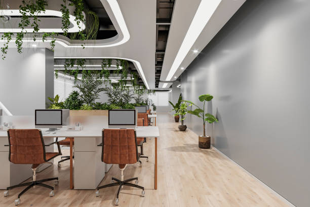 istock an office with wood desks, gray wall paint, and loft style. 2157387200