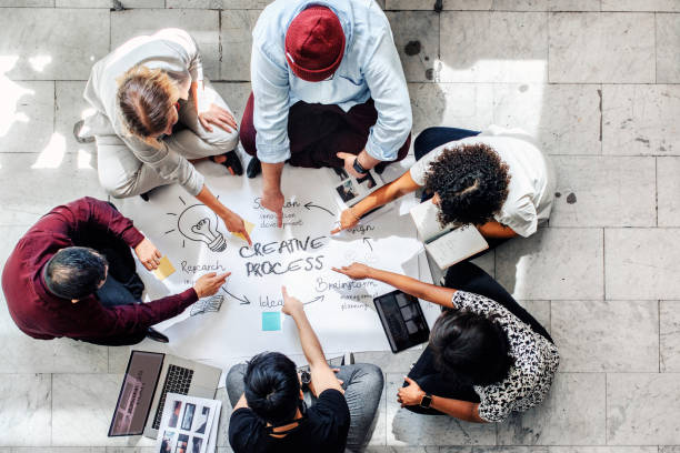 istock Business people brainstorming management process on paper 2157387601