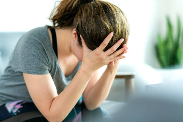 istock Emotionally stressed woman not feeling well 2157388287