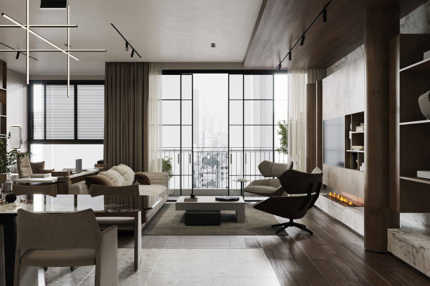 istock Interior with a large gray sofa, coffee table, big windows, fireplace in front of the sofa 2157388919