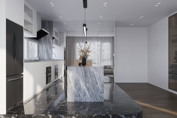 istock View of a modern designer kitchen with smooth handleless cabinets with black fridge and countertop. 2157389498