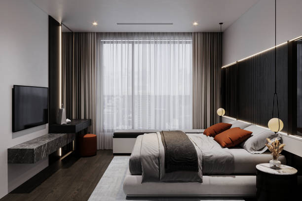 istock Big comfortable double royal bed in an elegant classic interior, sunlight streaming in through the window. 2157390063