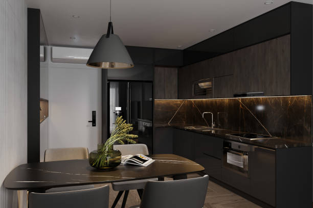 istock Small and trendy designed flat interior with stylish black and gold kitchen, new style dining area 2157390494