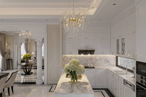 istock Open Concept Elegant and Spacious Kitchen with Marble Countertops, Chandelier, and white Toned Cabinets 2157391405