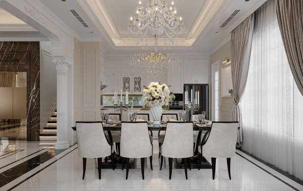istock The dining room is designed with a modern table, upholstered dining chairs, and a striking chandelier 2157391427