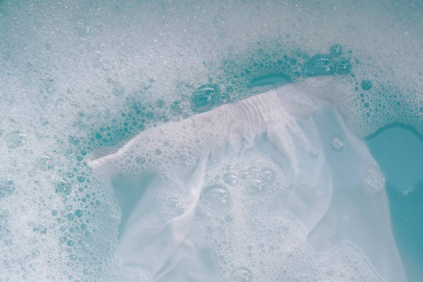 istock Soak a cloth before washing, white cloth 2157391715