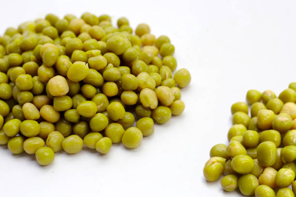 istock Canned green peas on white background. 2157393890