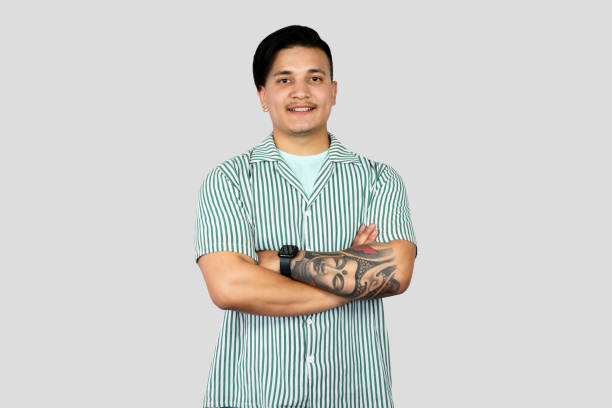 istock Asian Young Student Entrepreneur Giving Expressions and Making Gestures with Happy face Pointing 2157394694