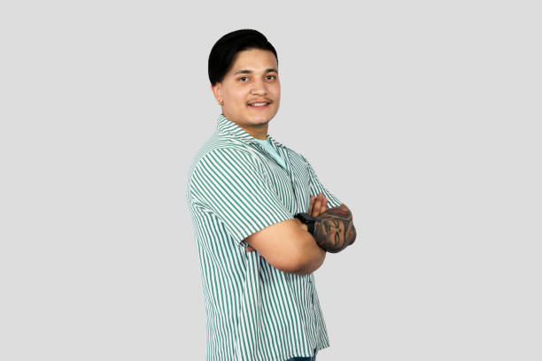 istock Asian Young Student Entrepreneur Giving Expressions and Making Gestures with Happy face Pointing 2157394698