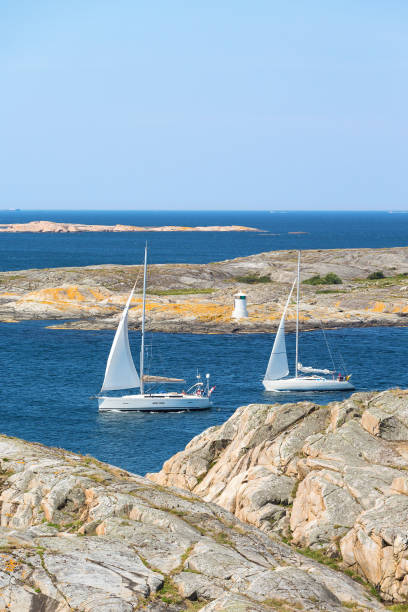istock Sailboats sailing in rocky sea archipelago 2157396921