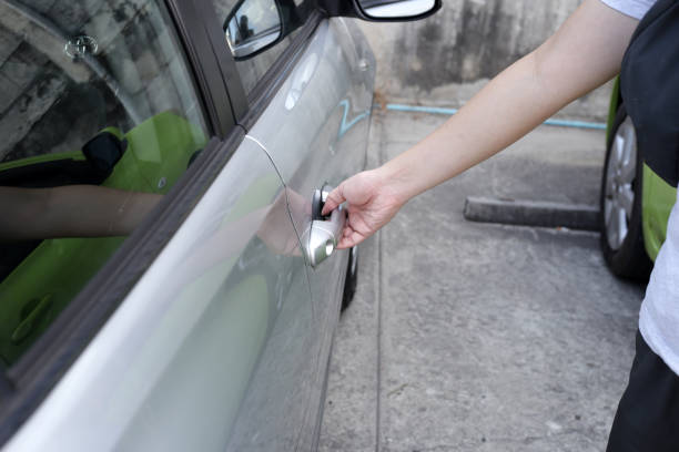 istock Male hand opening car door 2157397324